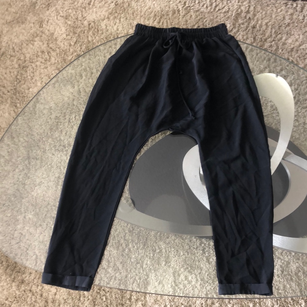 Black tie pants with cropped ends